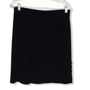 BCBGMaxazria black skirt with white trim at bottom
